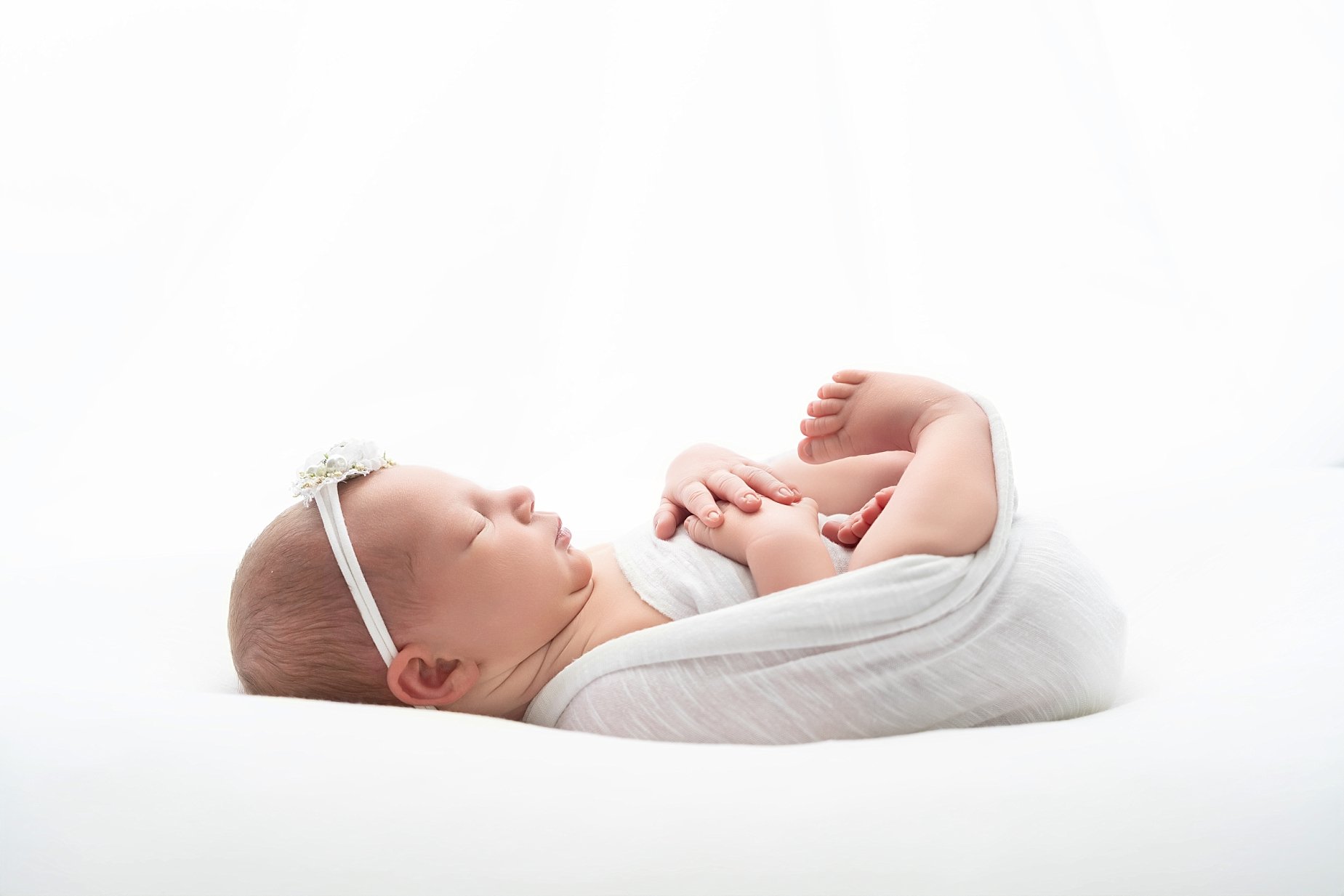 Tiny fingers, tiny toes, and a tiny little profile that won&rsquo;t stay little for long. 🤍✨

The newborn stage passes in the blink of an eye &mdash; these are the moments worth holding onto forever. 💕

Now booking newborn sessions in Glen Carbon &