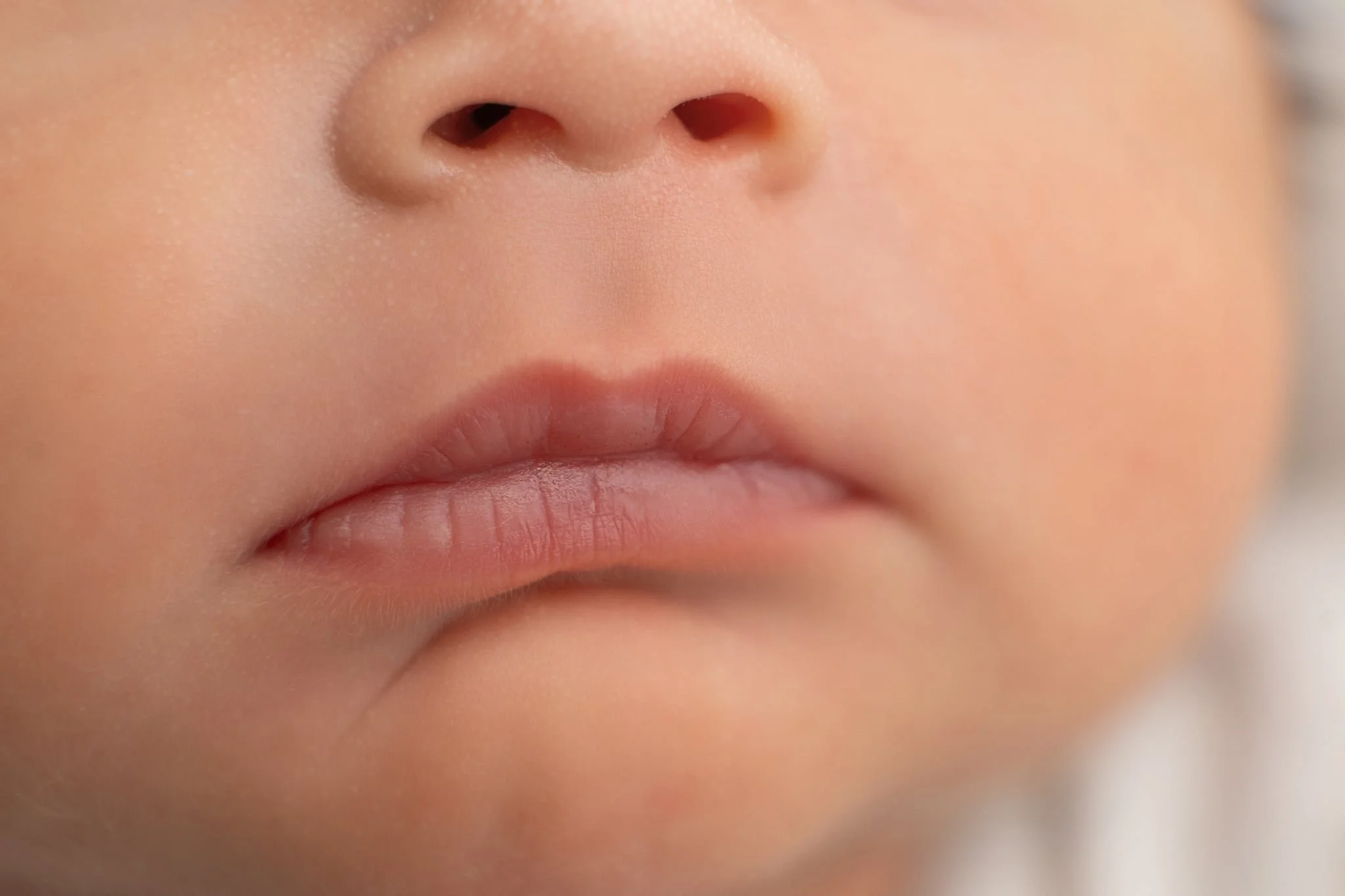 Newborn lips close-up during studio photography in Glen Carbon, Illinois