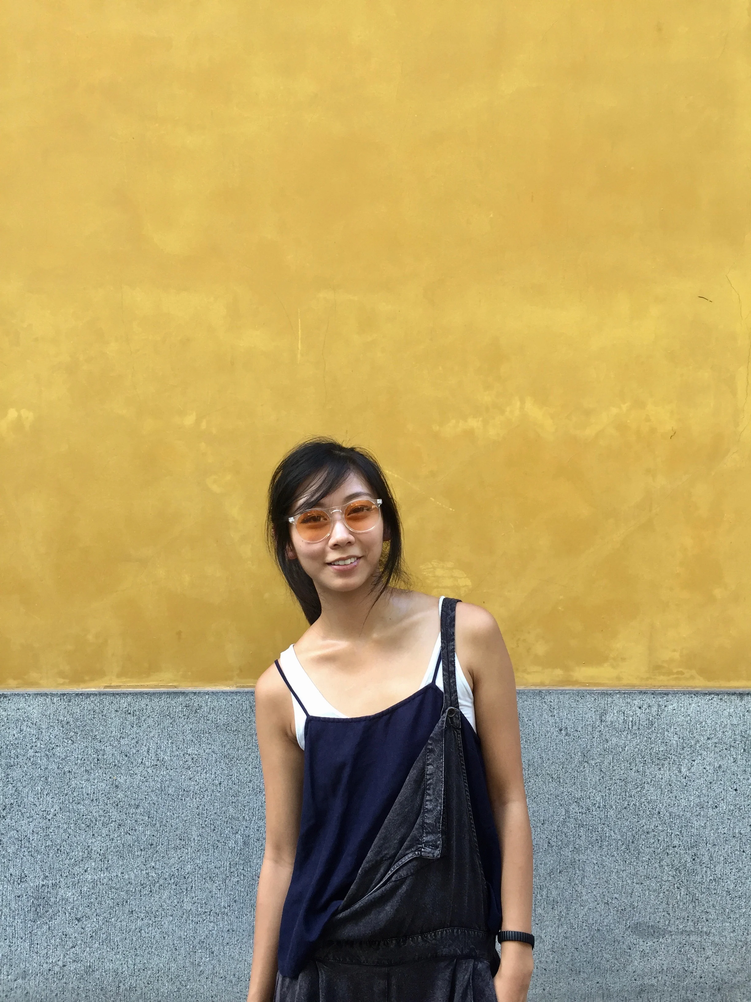 style travel blogger in china yellow background contrast