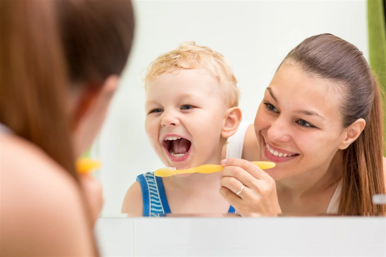 kids-brushing-at-home-uptown-fort-mcmurray-1326-x-884.jpg