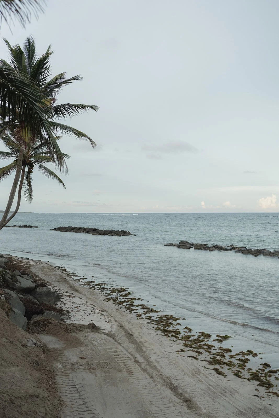 Turquoise shoreline and beach at Coconut Bay Beach Resort, St. Lucia