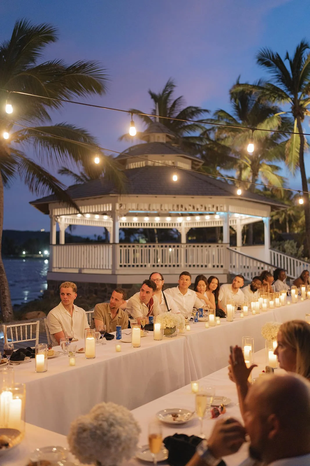 The St. Lucia resort grounds at golden hour, set for the wedding weekend welcome dinner