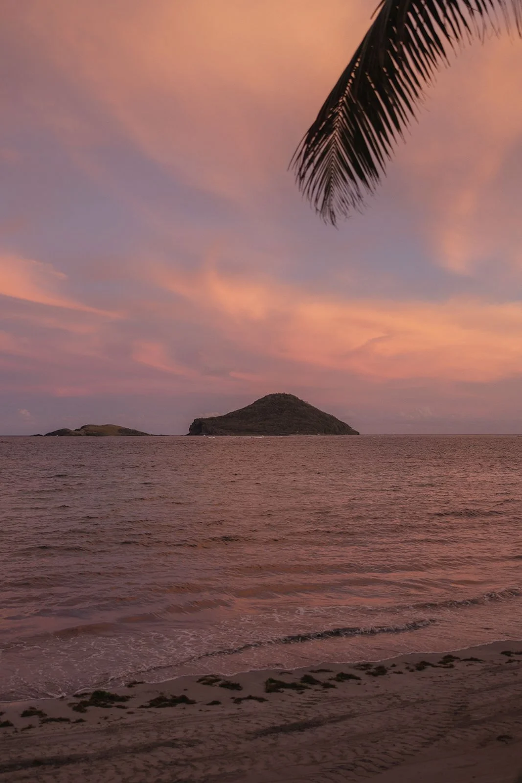 Sunset over the water at the St. Lucia resort during the wedding weekend