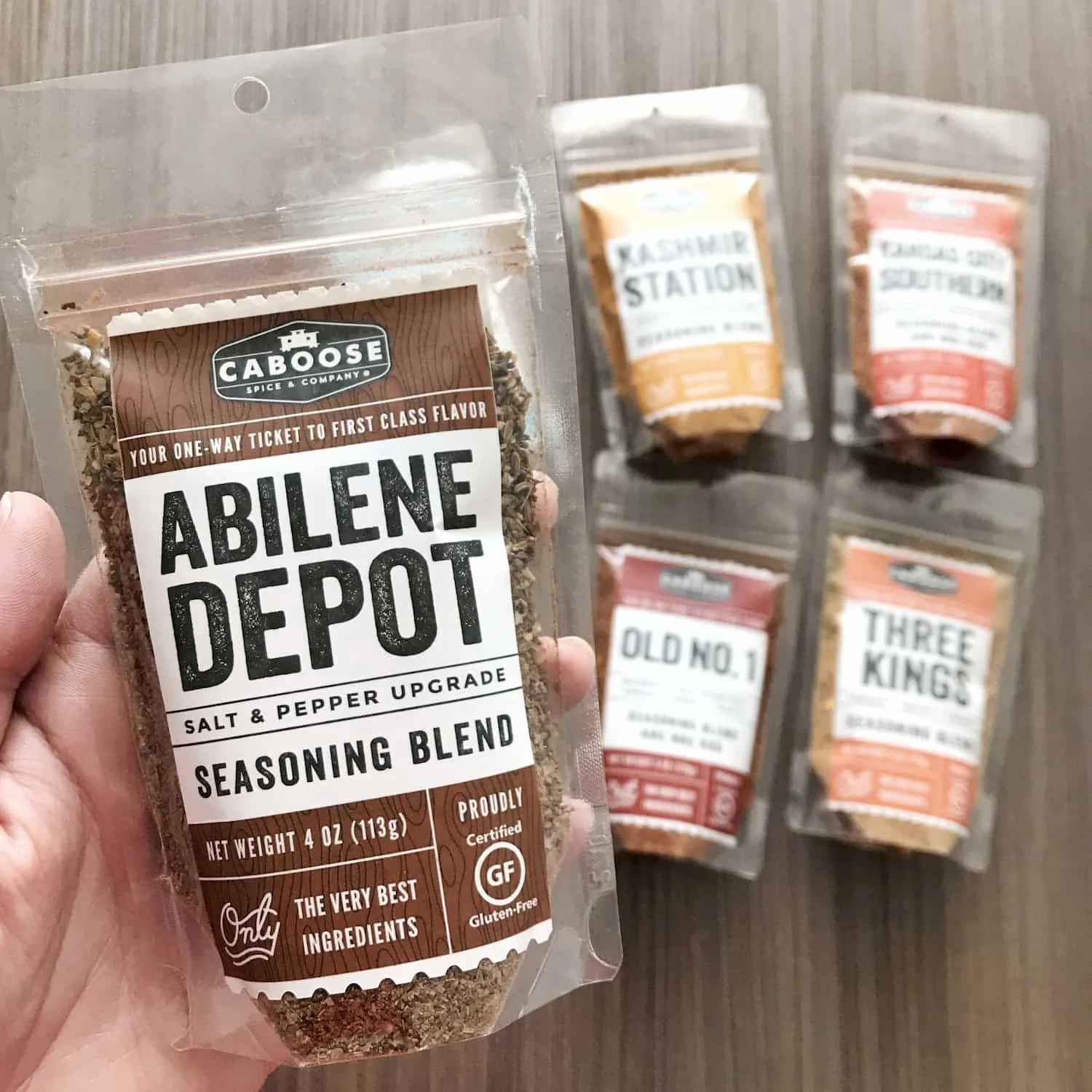 Abilene Depot 4 oz pouch in hand size reference.jpg