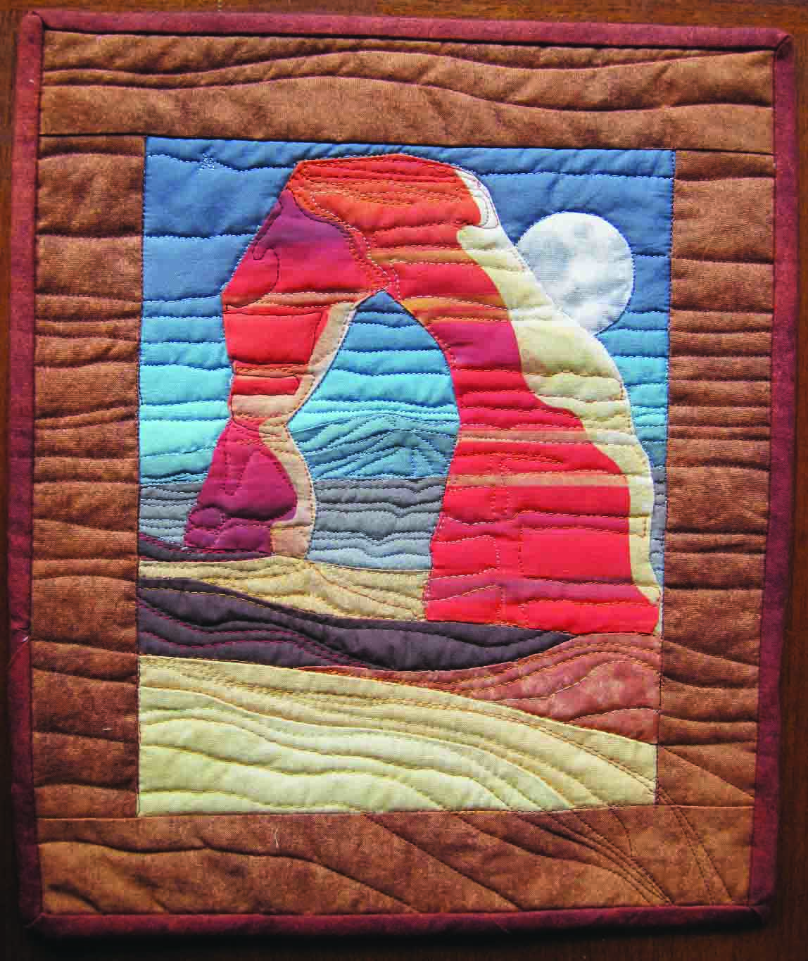 DELICATE ARCH QUILT.jpg