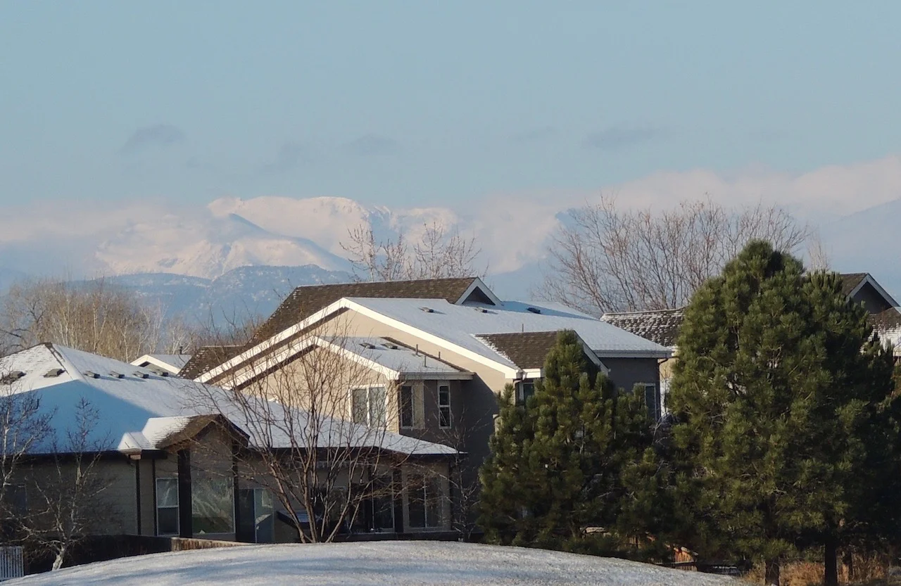 Rooftop view of snowy peaks.jpg