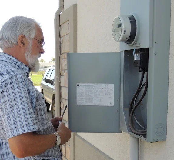 Inspecting main electrical panel.jpg