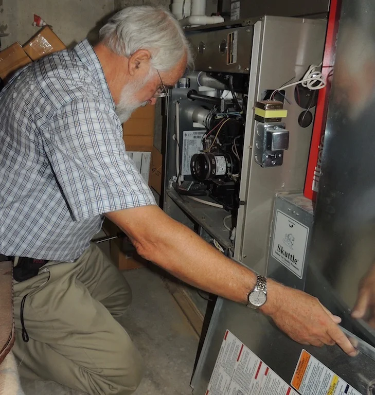 Inspecting the furnace.jpg