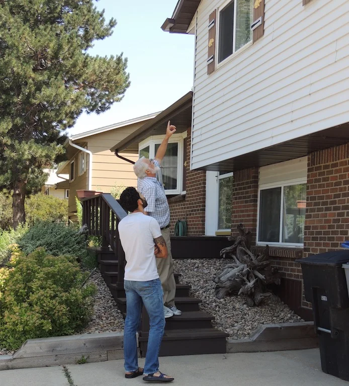 Inspecting roof drainage.jpg