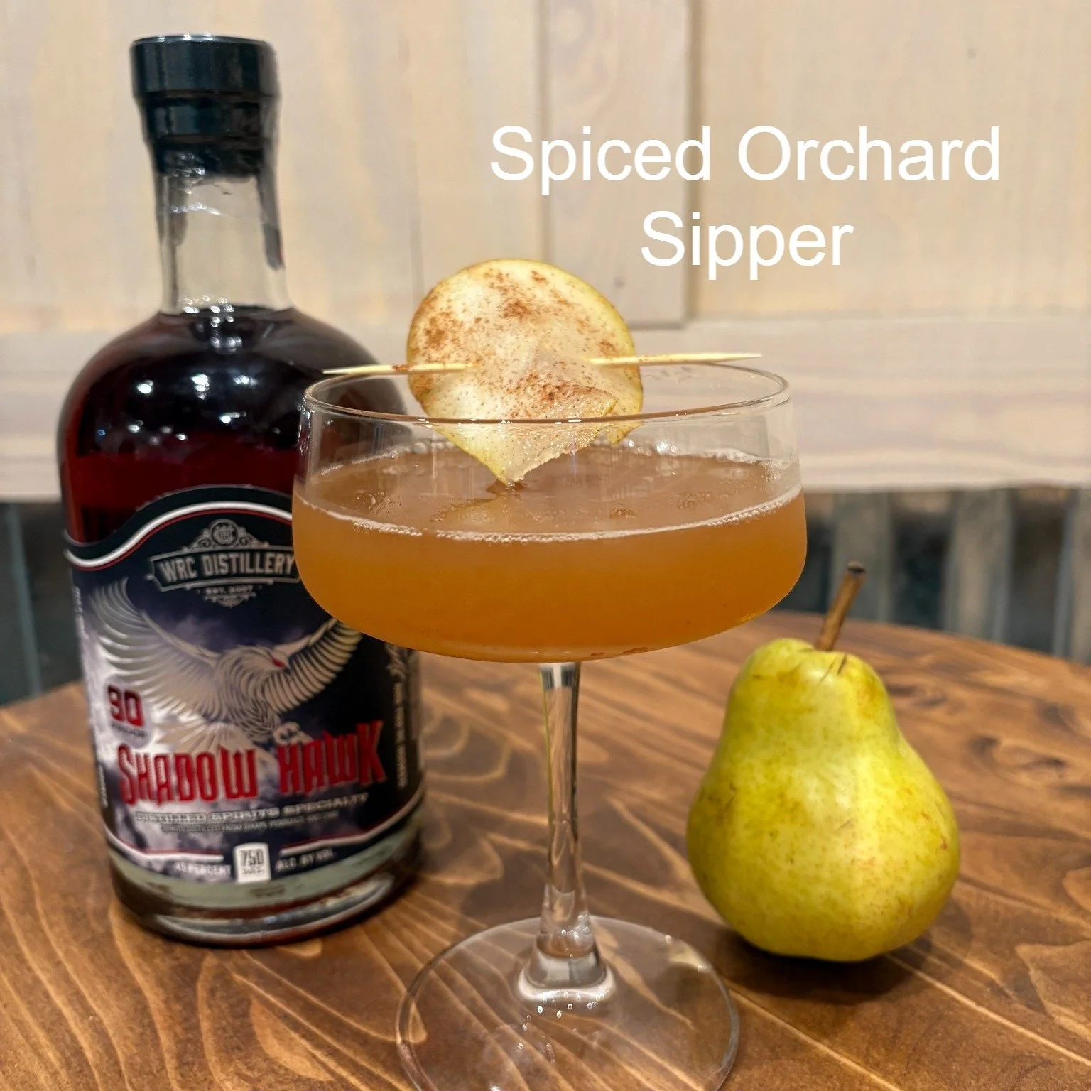 🍐 Spiced Orchard Sipper

Smooth, seasonal, and subtly spiced &mdash; this one's built for crisp evenings and colorful leaves.

Ingredients:
1.5 oz Shadow Hawk
1 oz pear nectar or juice
0.5 oz cinnamon-honey syrup
Dash of fresh lemon juice
Pear slice