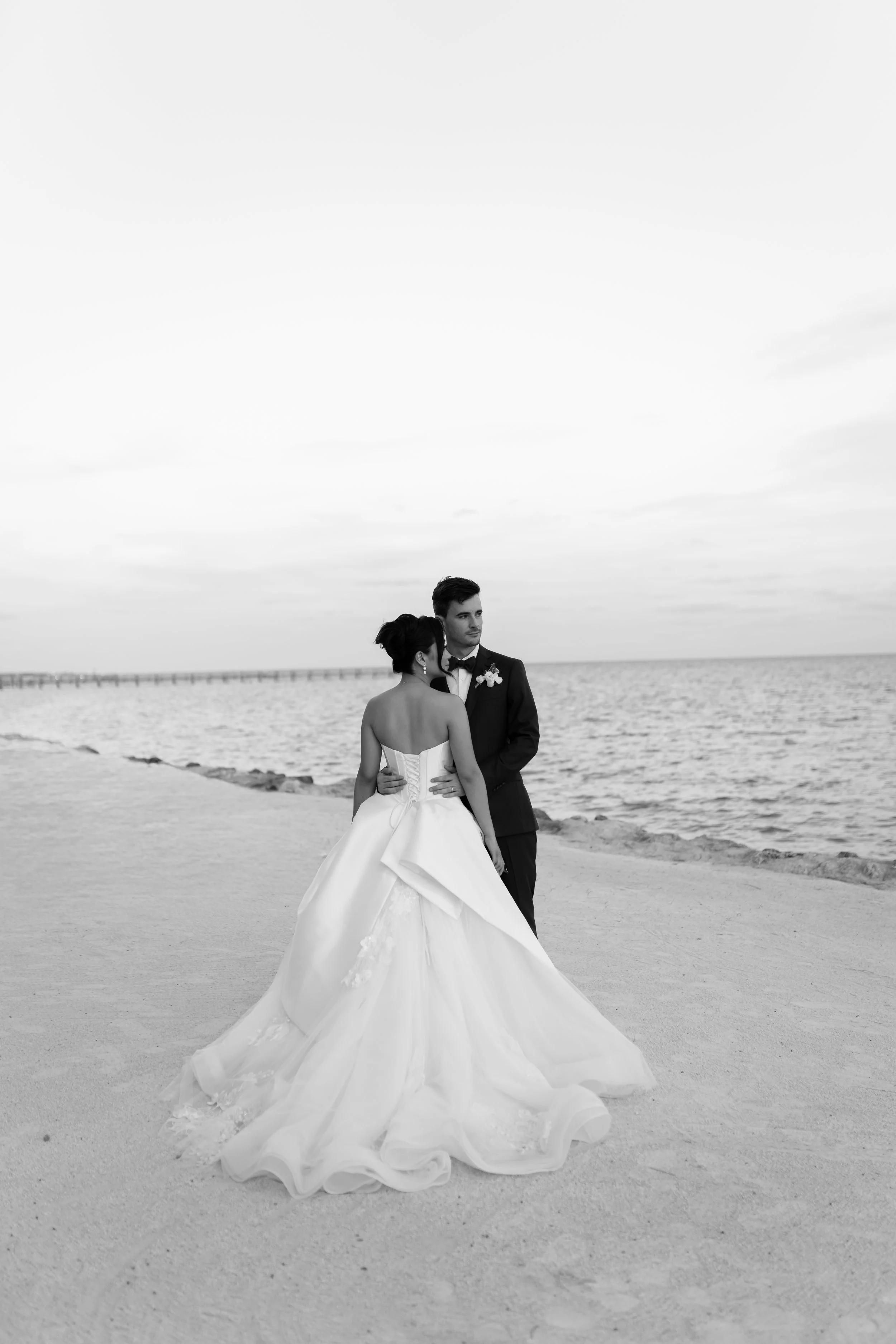 South Florida Wedding photographer, photographing a keys wedding at Cheeca Lodge. Bride and groom portraits on the beach at sunset.