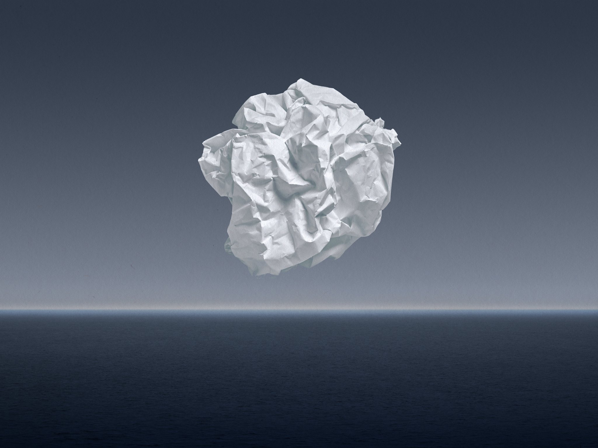 Crumpled paper over sea.jpg