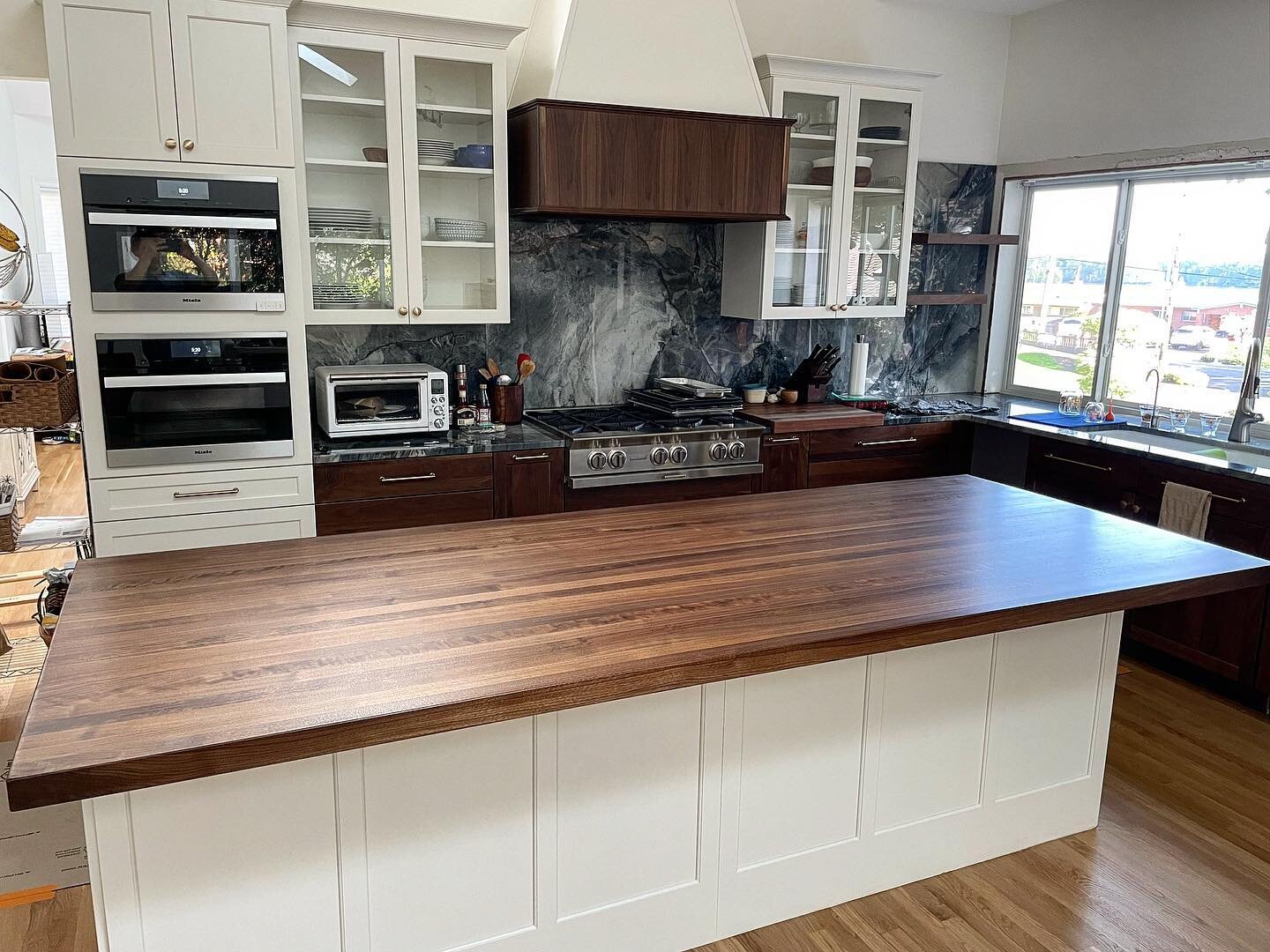 And there&rsquo;s that! One massive solid walnut island top for some awesome clients and their new kitchen. Finished with @waterlox  and @bidwellwoodandiron hardware.
⠀⠀⠀⠀⠀⠀⠀⠀⠀⠀⠀
#woodworking #finewoodworking #furnituremaker #madeinoregon #madeinport