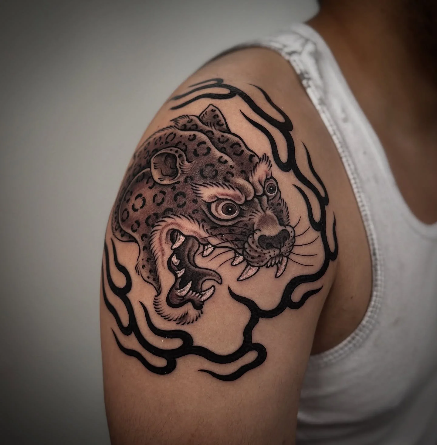 Variations on a theme. 

Nicolas came in and picked a rad cat from my book of flash. He also liked the ornamental flames I&rsquo;ve done recently, and here you have the results!!

Winner winner 🏆 🔥 🐆 🤌

LINK IN BIO TO BOOK ⛓️
