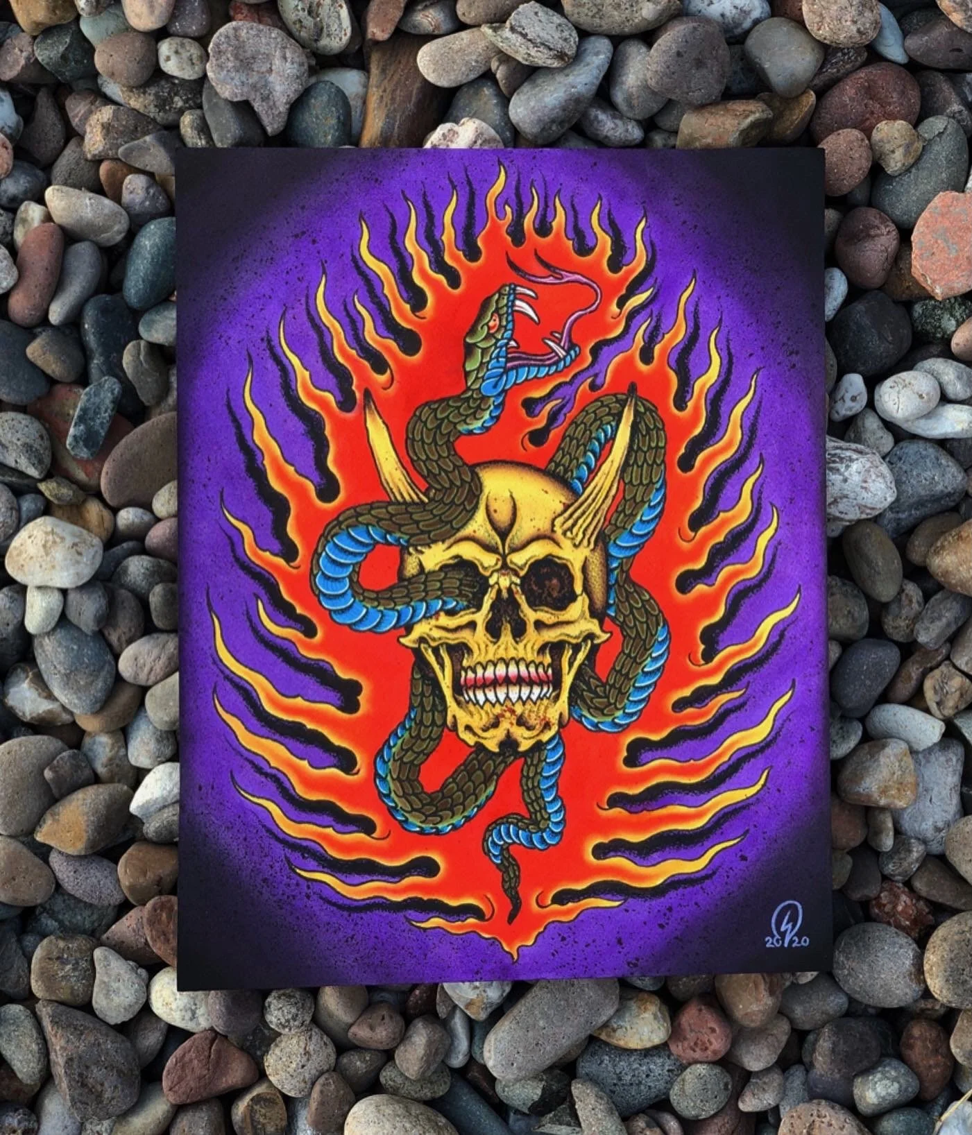 A vibrant artwork depicting a skull with a snake wrapped around it, surrounded by flames and purple background.