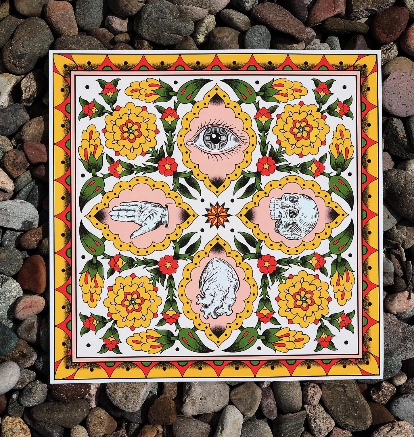 A colorful, patterned illustration featuring a central eye, a skull, a hand pointing, and a wrinkled animal face, surrounded by floral designs and a decorative border.