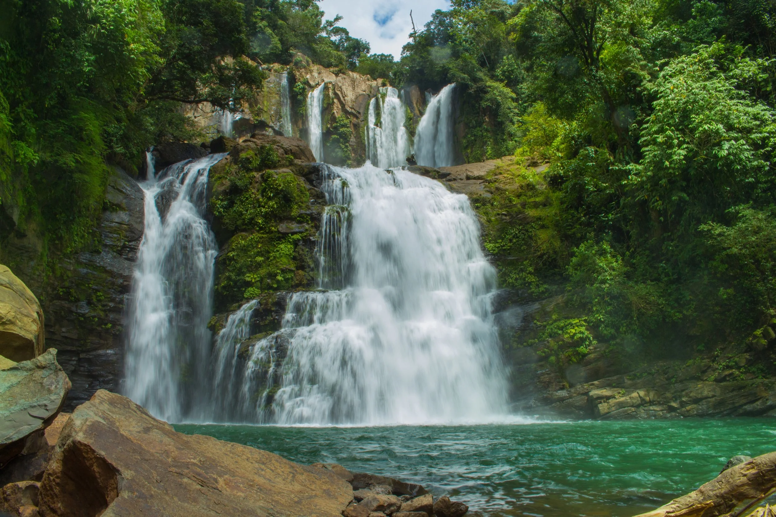  Nauyaca Waterfall, nestled in the lush jungles of Costa Rica's Southern Pacific region, is a breathtaking natural wonder that captivates all who visit. With its two stunning cascades dropping over 200 feet, this majestic waterfall offers a dramatic 