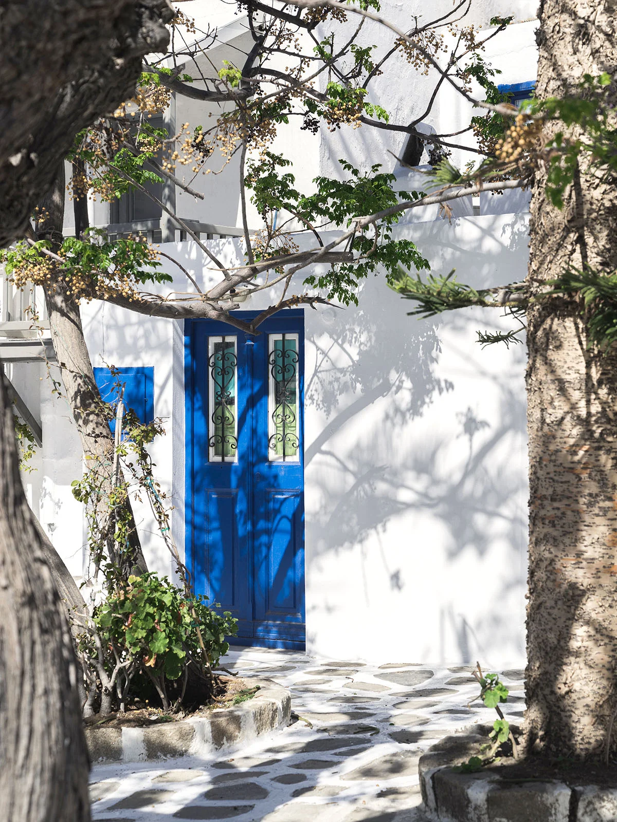 candy-lai-flosslai-mykonos-blue-doors.jpg