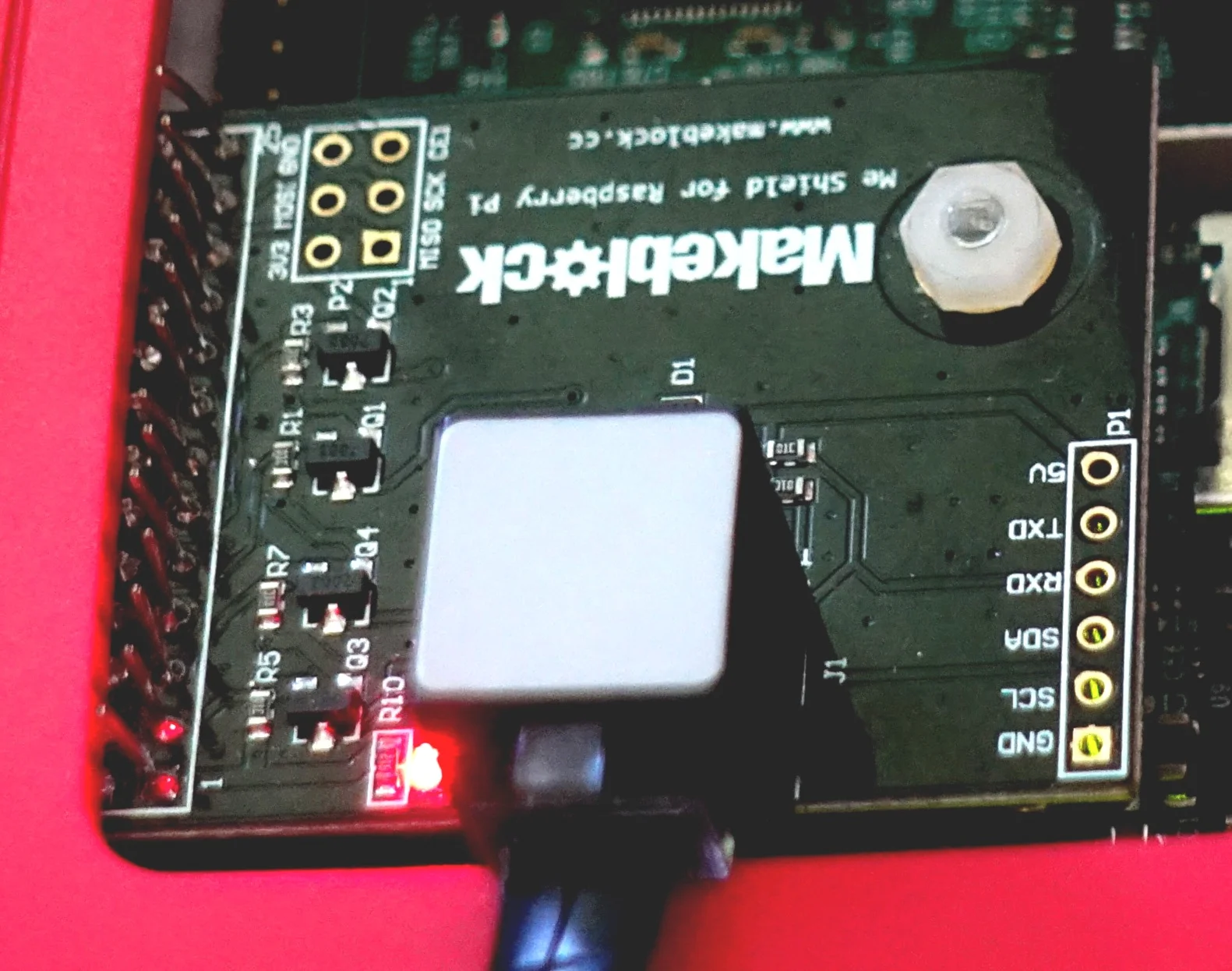 The red LED should be on.