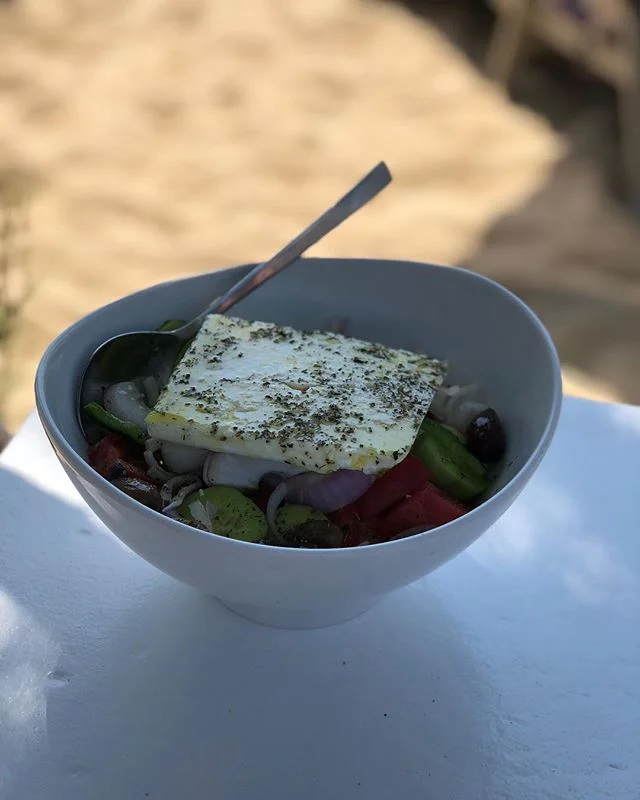 Real #greeksalad in #greece!! Eating on the beach! Nothing better!  Learn how to be the healthiest version of you at wolffweightandwellness.com.
Download our weight loss and lifestyle guide! Lose weight just by eating real food the right way! You can