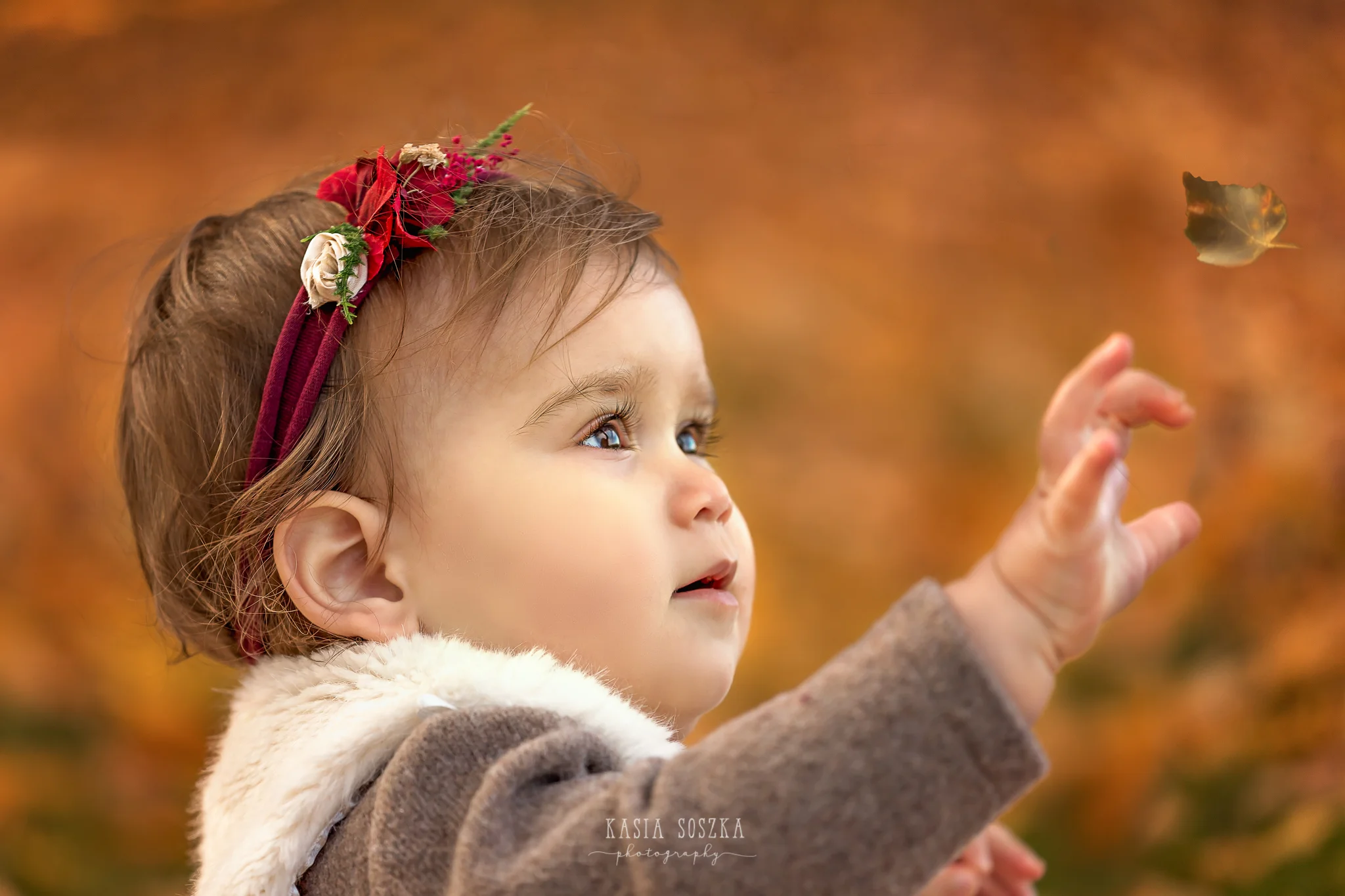 Baby milestone photography Leeds, York, Bradford, Harrogate: cute baby girl’s first birthday portrait session. Autumn outdoor baby photo shoot in Leeds, Yorkshire