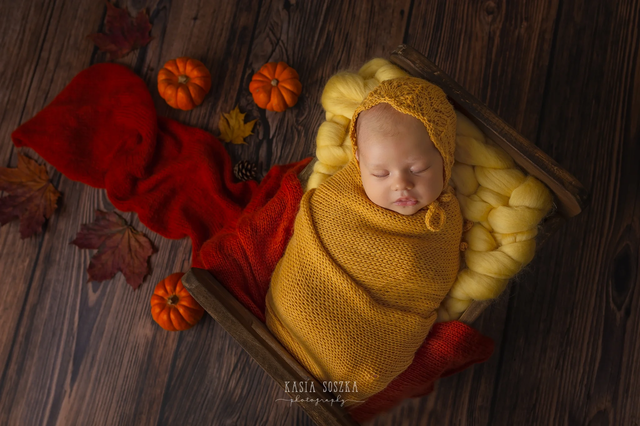 Newborn photography Leeds-York-Bradford-Harrogate: autumn themed newborn session in Leeds, Yorkshire. Cute newborn baby girl in an autumn set up