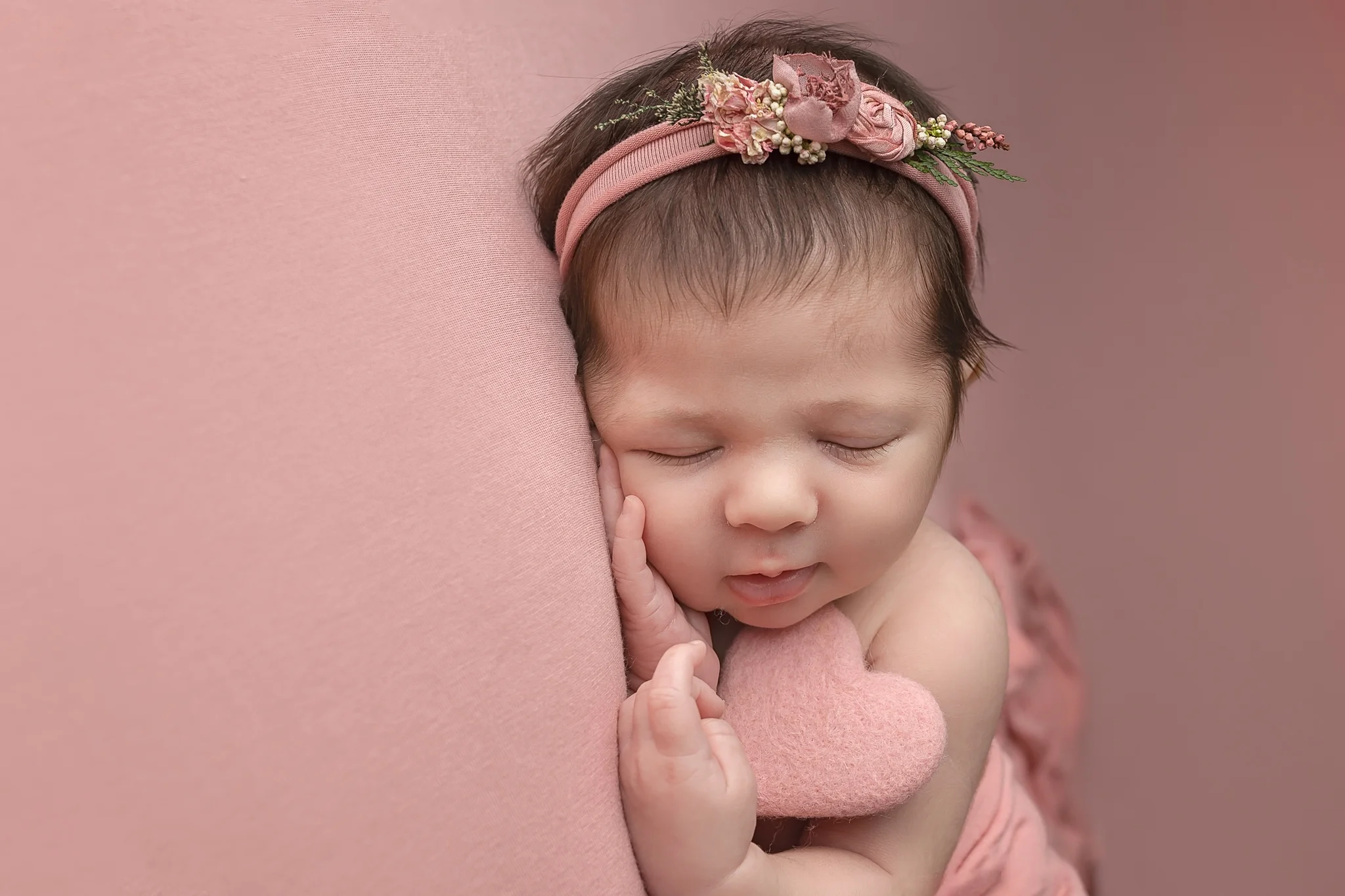 Newborn photography Leeds, York, Harrogate, Bradford, newborn photographer Leeds, Yorkshire: adorable newborn baby girl sleeping on a pink blanket