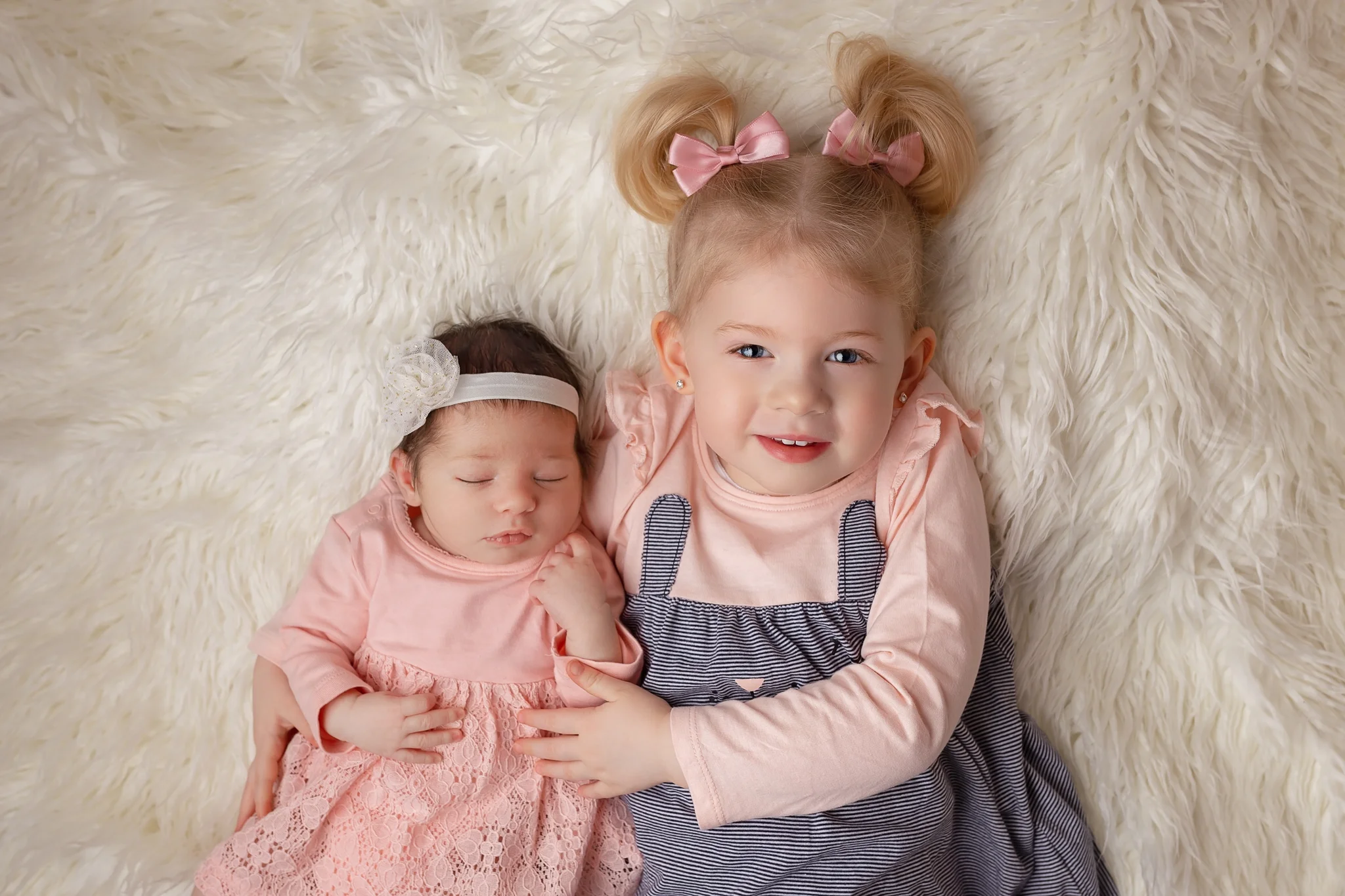 Newborn photography Leeds, York, Harrogate, Bradford, newborn photographer Leeds, Yorkshire: newborn with a sibling photo session in Leeds, Yorkshire,