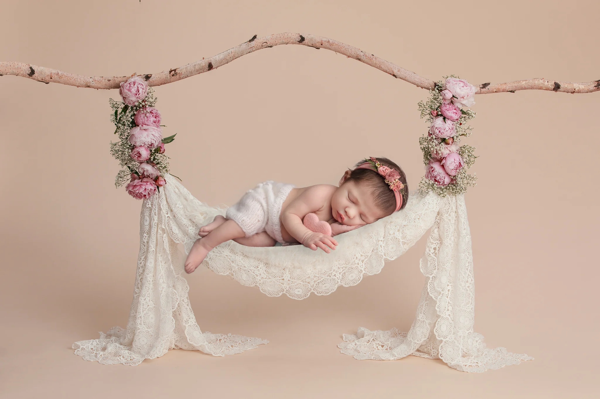 Newborn photography Leeds, York, Harrogate, Bradford, newborn photographer Leeds, Yorkshire: adorable newborn baby girl sleeping on a hammock