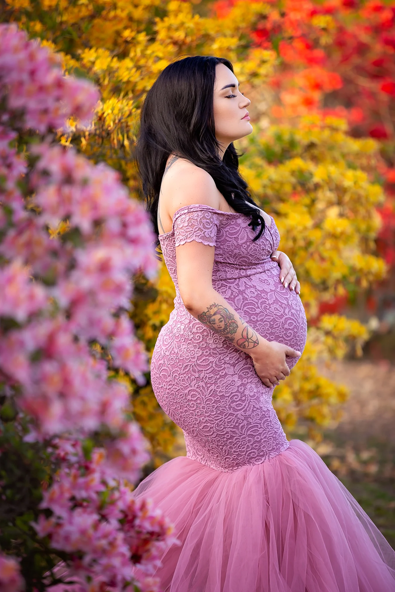 Pregnancy photography Leeds, York, Harrogate, Wakefield, Bradford: stunning mum-to-be in a long dusky pink gown posing for a pregnancy photo in Leeds, West Yorkshire