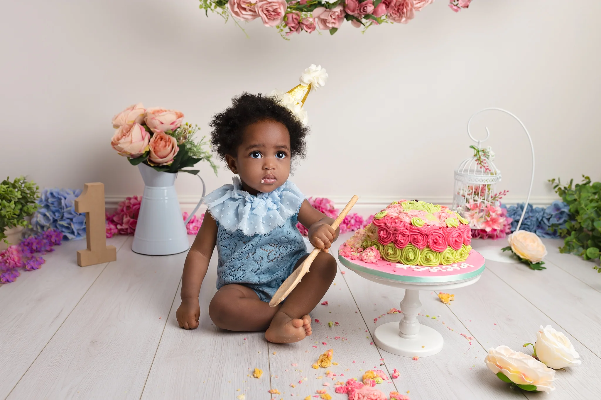 Professional baby photography Leeds, Bradford, York, Harrogate, Wakefield: baby girl cake smash session in Leeds, West Yorkshire