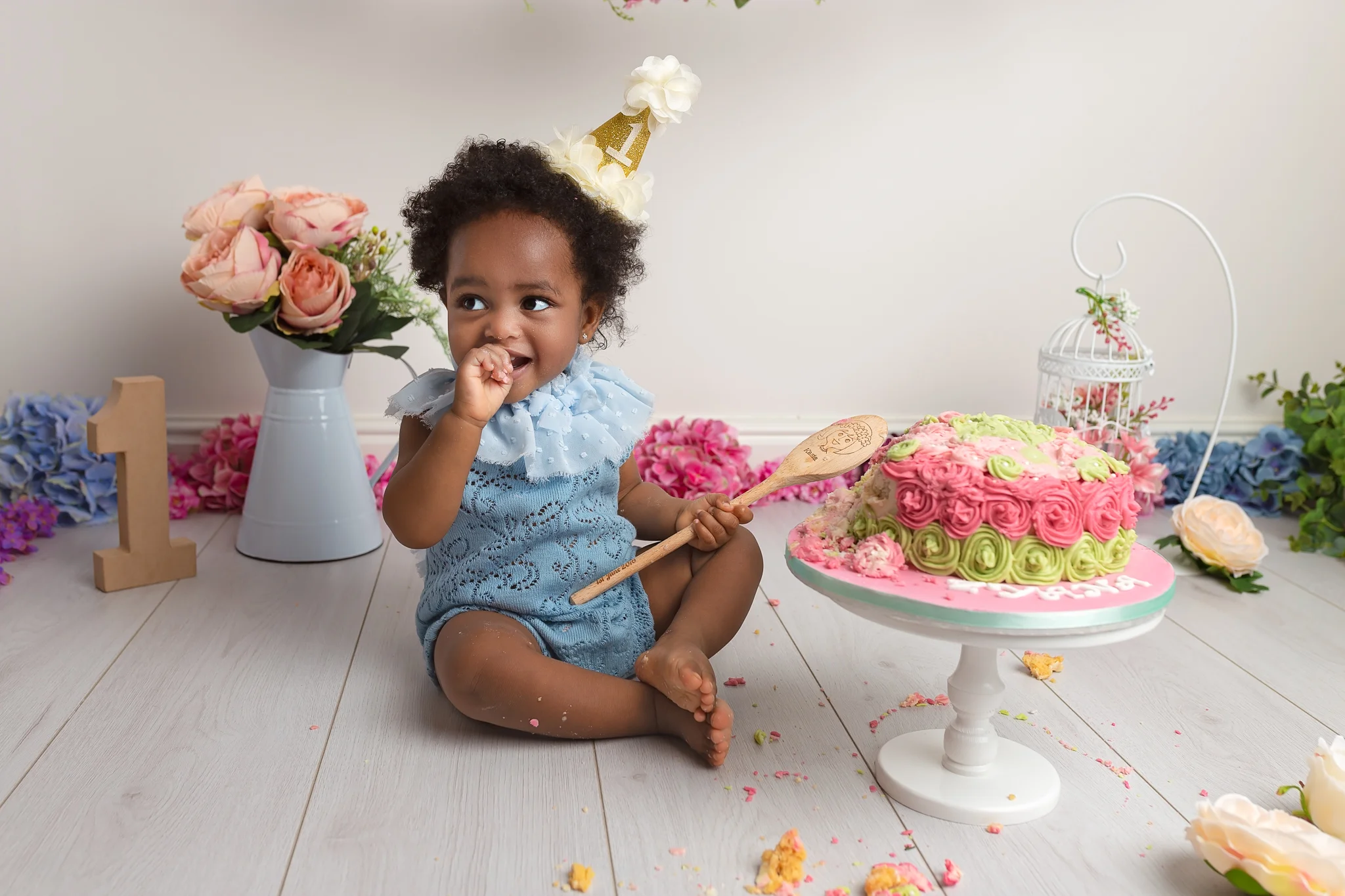 Professional baby photography Leeds, Bradford, York, Harrogate, Wakefield: baby girl cake smash session in Leeds, West Yorkshire