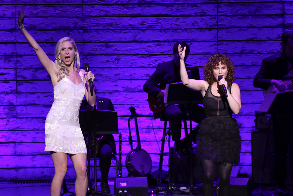 Broadway theatre performers singing on stage