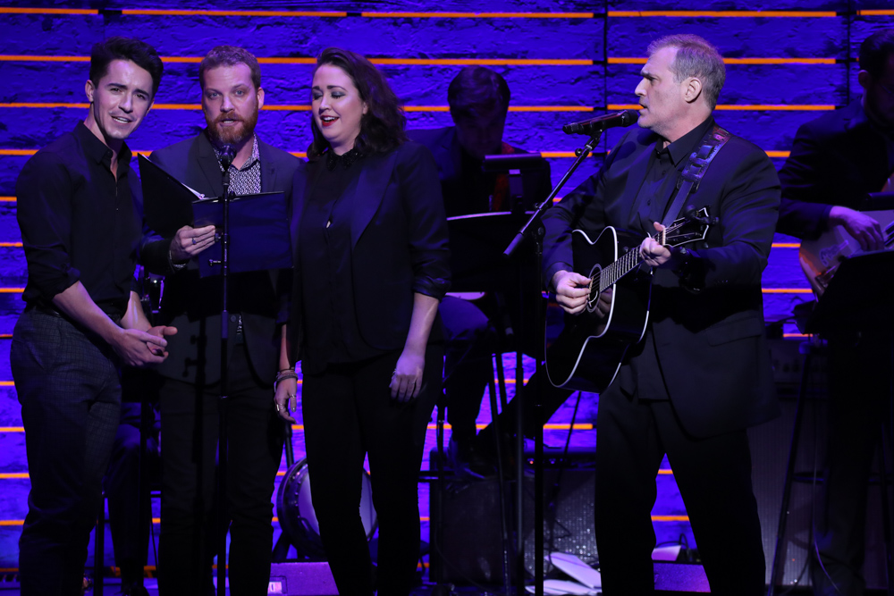 Broadway theatre performers singing on stage