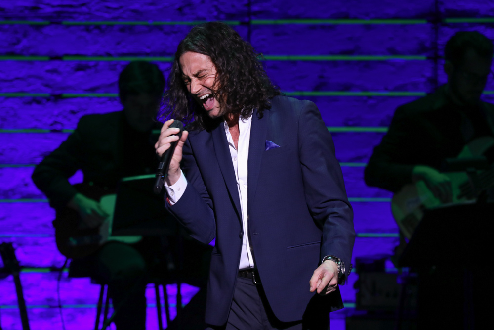 Constantine Maroulis singing on stage at Only Make Believe Gala