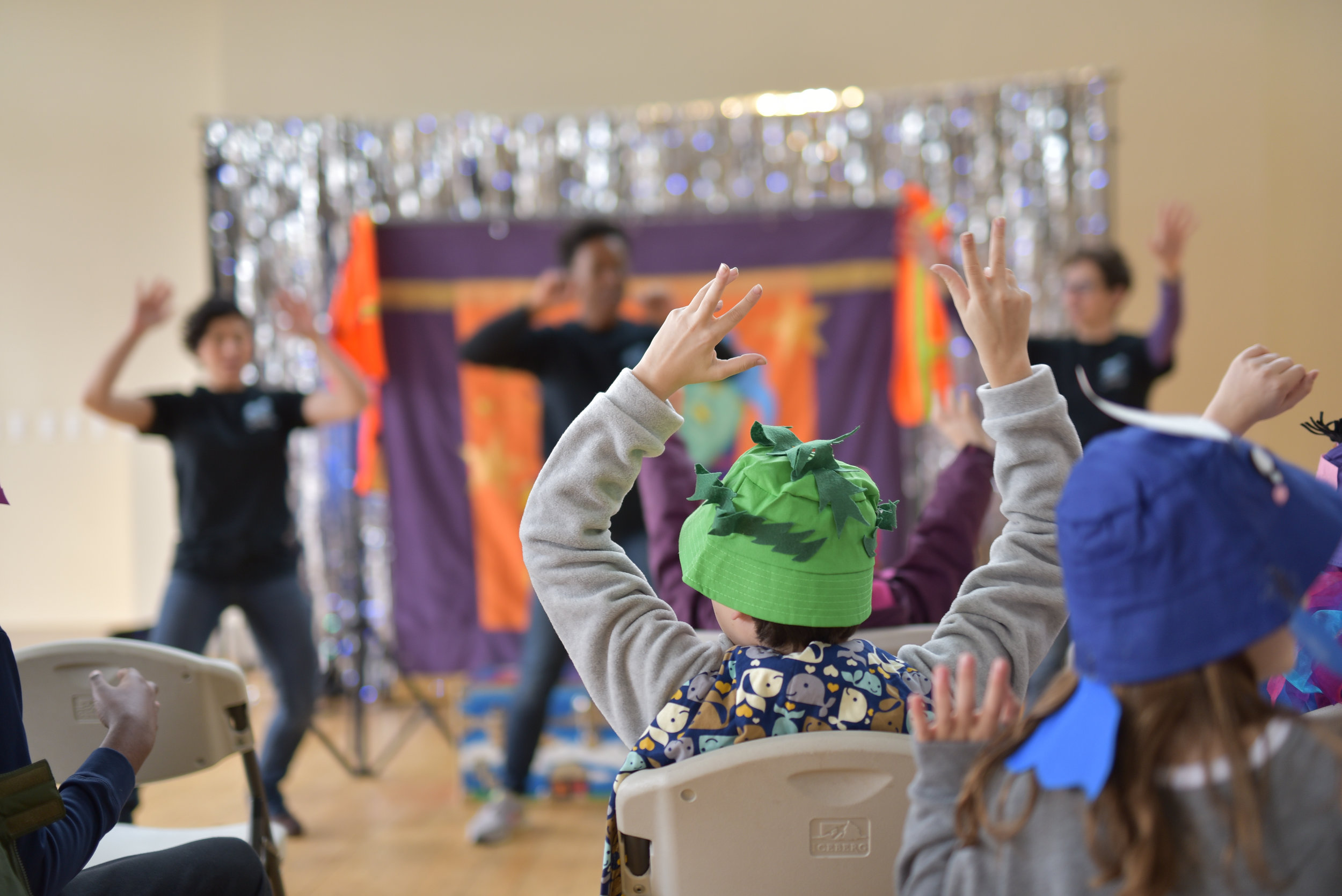 Children playing during children's theatre performance