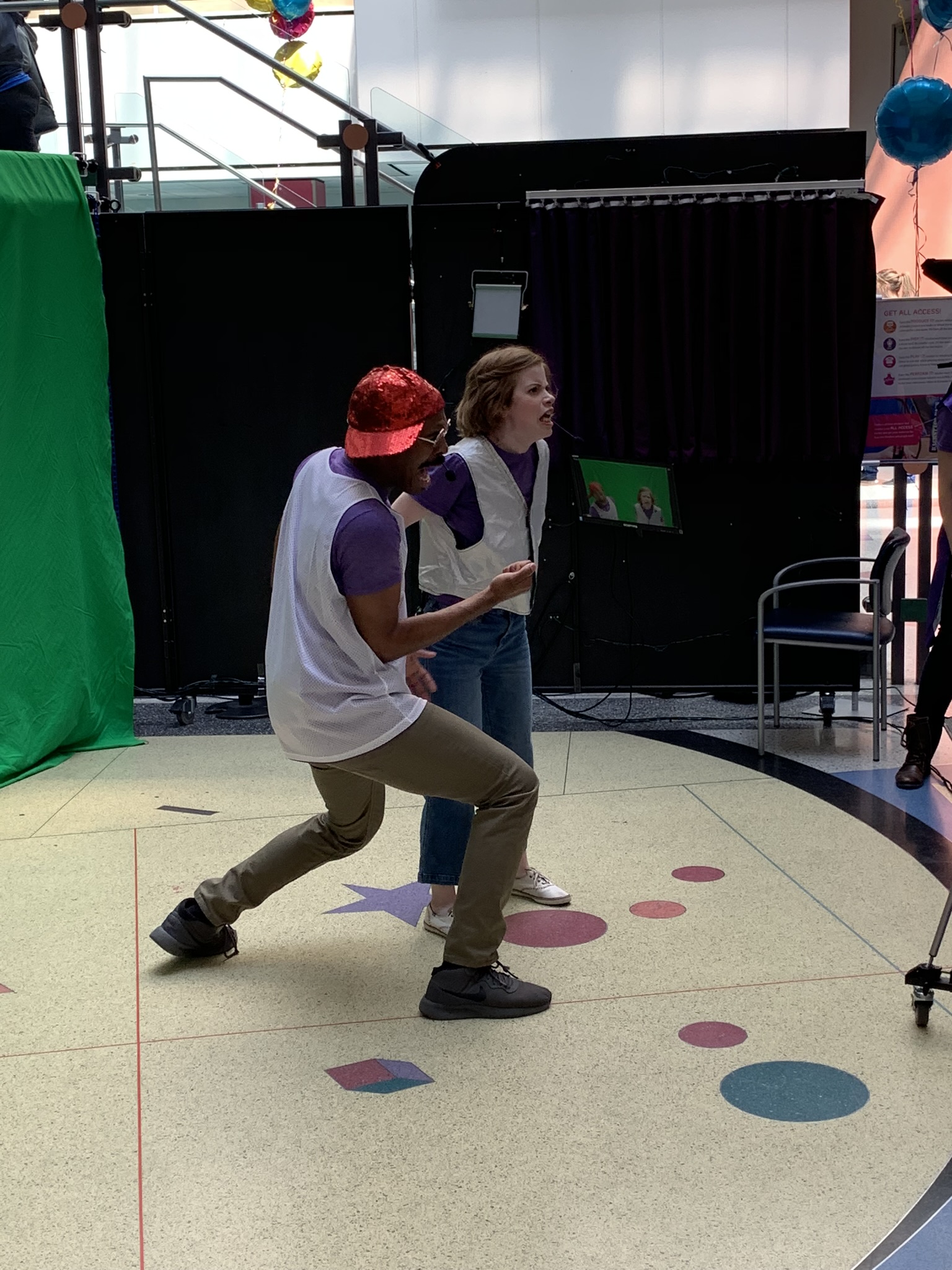 Actors performing in front of green screen