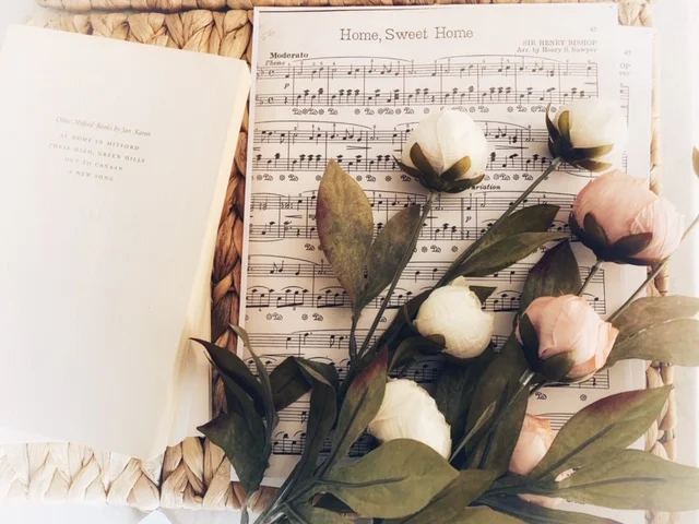 Books, sheet music, faux flowers