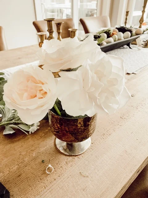Arrange major flowers around sides and top
