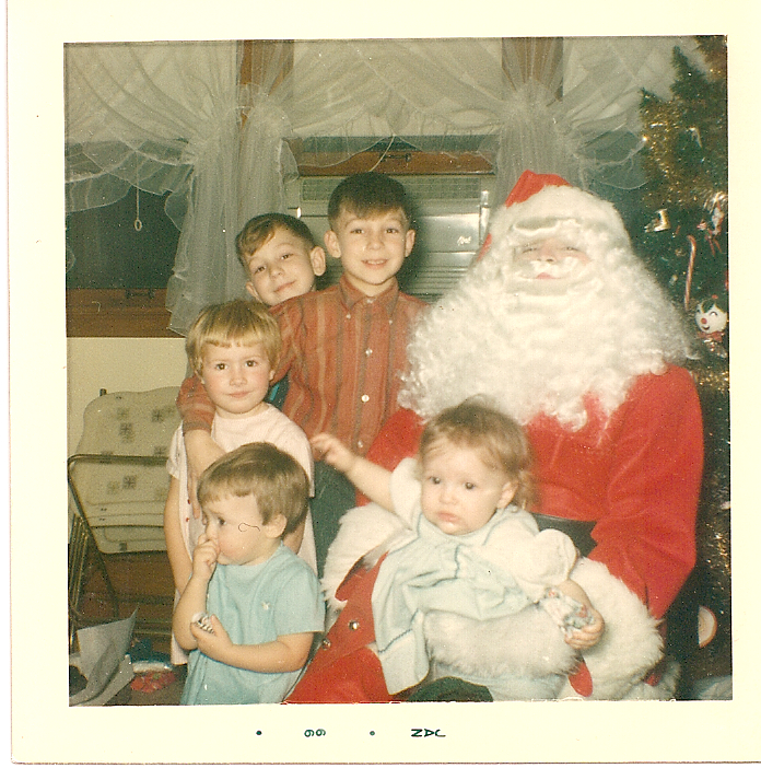 1965 Christmas Eve, tradition at the Atwell's: My Uncle Don playing santa, cousins Brian and Brad, me and my sisters Lynn and Lori.