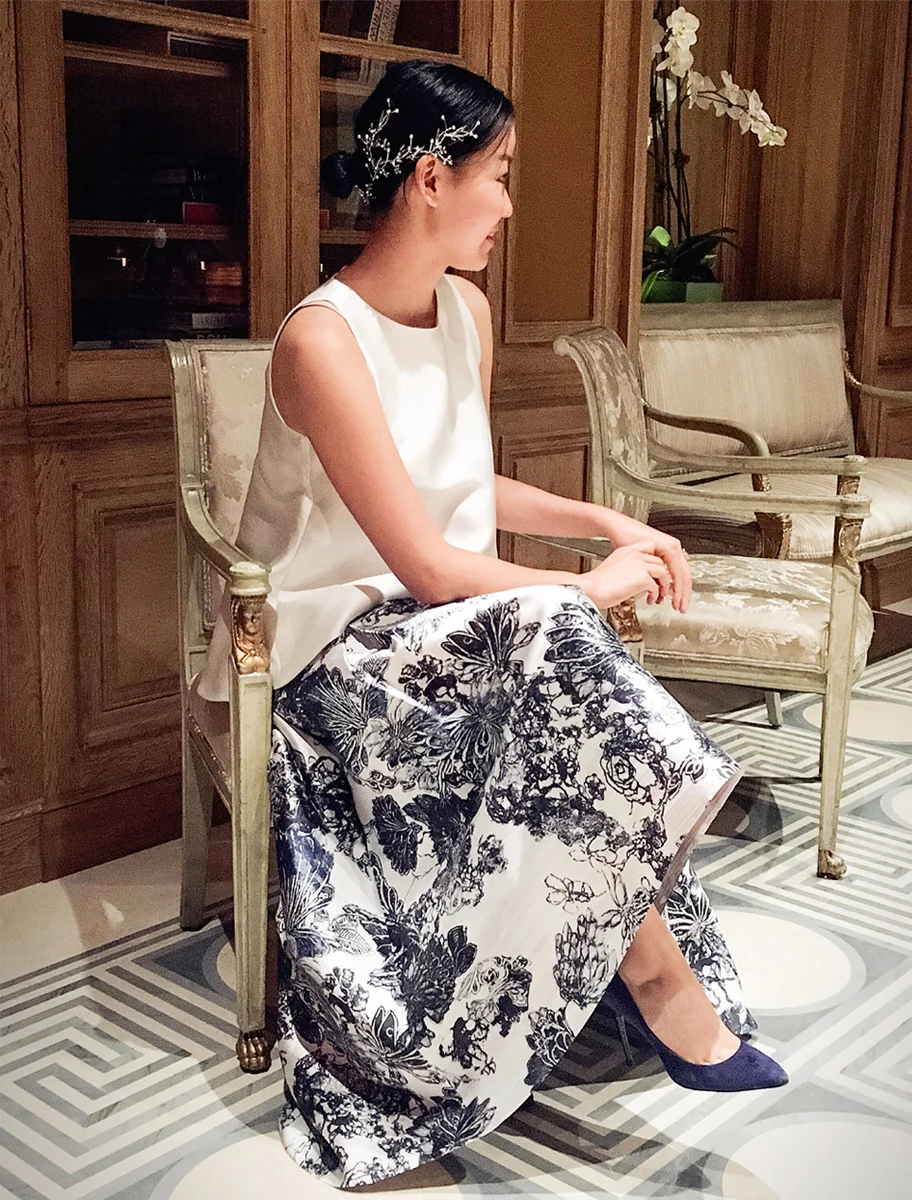 Maggie wearing a headpiece from her own collection.