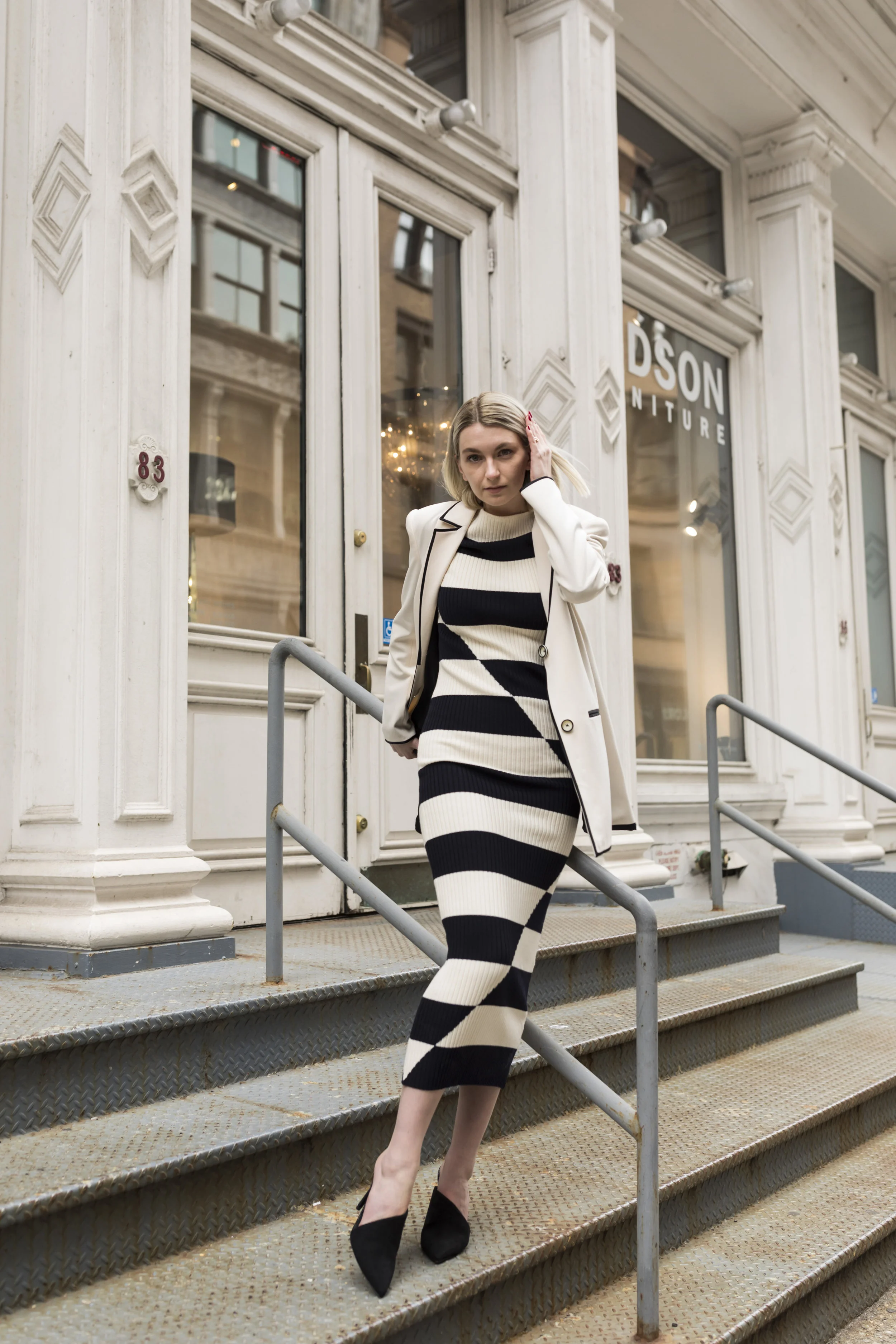 Madison, @madisonrussellx, looked beautiful in Donna’s Fall ‘19 collection striped dress. We love the monochrome color scheme with the clean, white jacket and black heels.