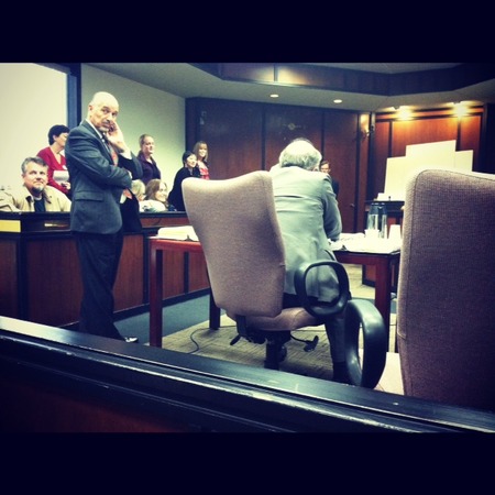 Photo: Taken during cross exam by a court observer. I am on the floor demonstrating how hard it is to put on and walk in a rigid leg brace. Notice how happy and engaged the jurors are. An unamused Nick is on the far left.