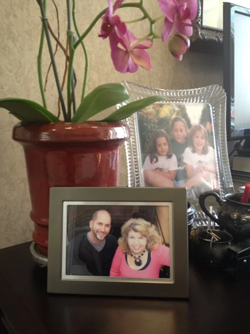 Photo: This is the photo John & Anne framed and gave to me a couple years ago. It sits on the front of my desk right next to my kids. The picture of the girls was taken when I started full time plaintiff law and is in a frame given to me by Tom Chambers.