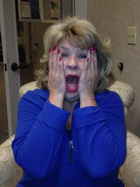 hoto: Anne mugging for the camera so we can show you what making a mistake feels like. Not that Anne ever makes mistakes. Notice how her fingernails perfectly match her lips. Talk about attention to detail.