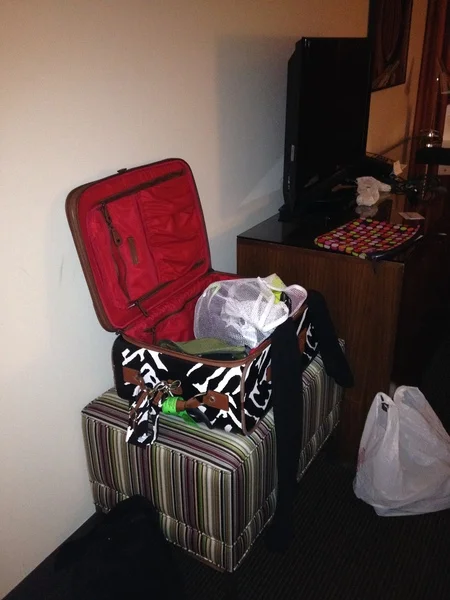 Photo: You know things are bad when a neat nick like me, leaves the suitcase out like this.