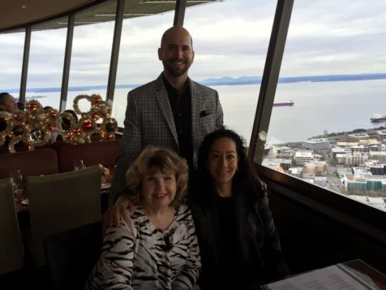 Photo: John, Anne and I making the best of the trial date continuance by eating lunch at the space needle.