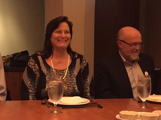 Photo: Clare at her surprise 30th work anniversary luncheon next to Gerhard.
