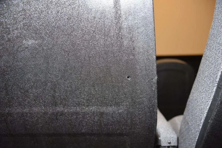 A bullet hole in the back of a seat at Regal Cinemas 14 at The Landing in Renton. (Renton Police Department)