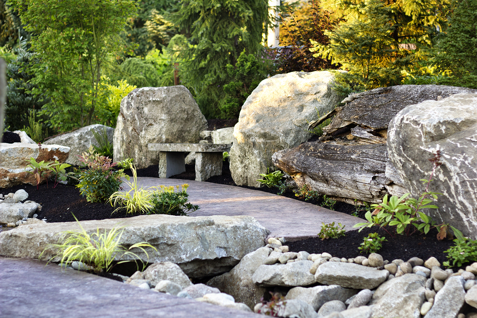 reduced_pc_landscaping_event_area_rock_bridge_water_feature.jpg